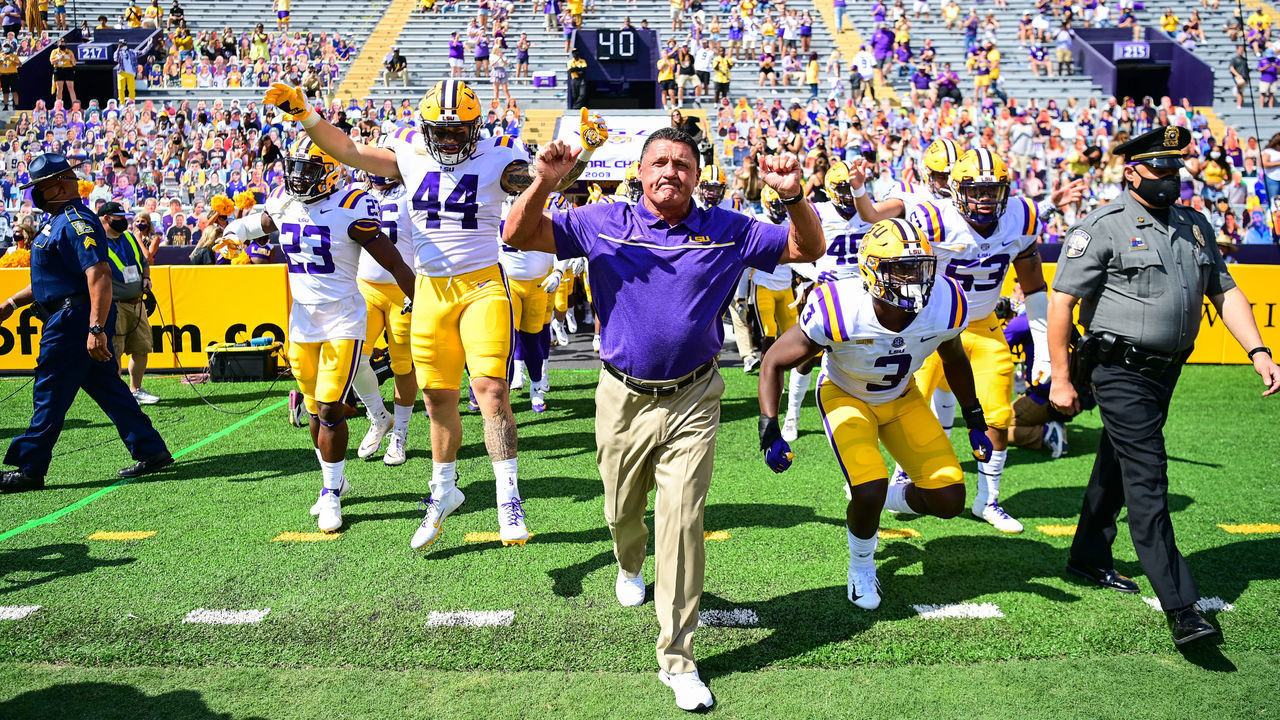 BATON ROUGE, LA - SEPTEMBER 26: Head coach Ed Orgeron leads the LSU Tigers onto the field before their game against the Mississippi State Bulldogs on September 26, 2020 at Tiger Stadium in Baton Rouge, Louisiana.