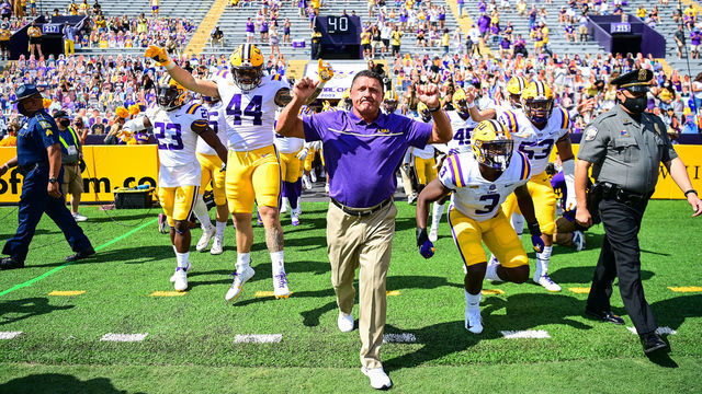 BATON ROUGE, LA - SEPTEMBER 26: Head coach Ed Orgeron leads the LSU Tigers onto the field before their game against the Mississippi State Bulldogs on September 26, 2020 at Tiger Stadium in Baton Rouge, Louisiana.