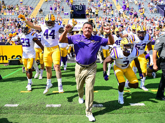 BATON ROUGE, LA - SEPTEMBER 26: Head coach Ed Orgeron leads the LSU Tigers onto the field before their game against the Mississippi State Bulldogs on September 26, 2020 at Tiger Stadium in Baton Rouge, Louisiana.