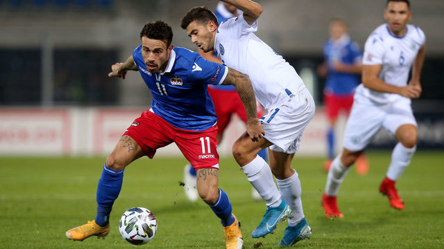 VADUZ, LIECHTENSTEIN - OCTOBER 13: (BILD ZEITUNG OUT) Dennis Slanovic of Liechtenstein and Lorenzo Lunadei of San Marino battle for the ball during the UEFA Nations League group stage match between Liechtenstein and San Marino at Rheinpark Stadion on October 13, 2020 in Vaduz, Liechtenstein.
