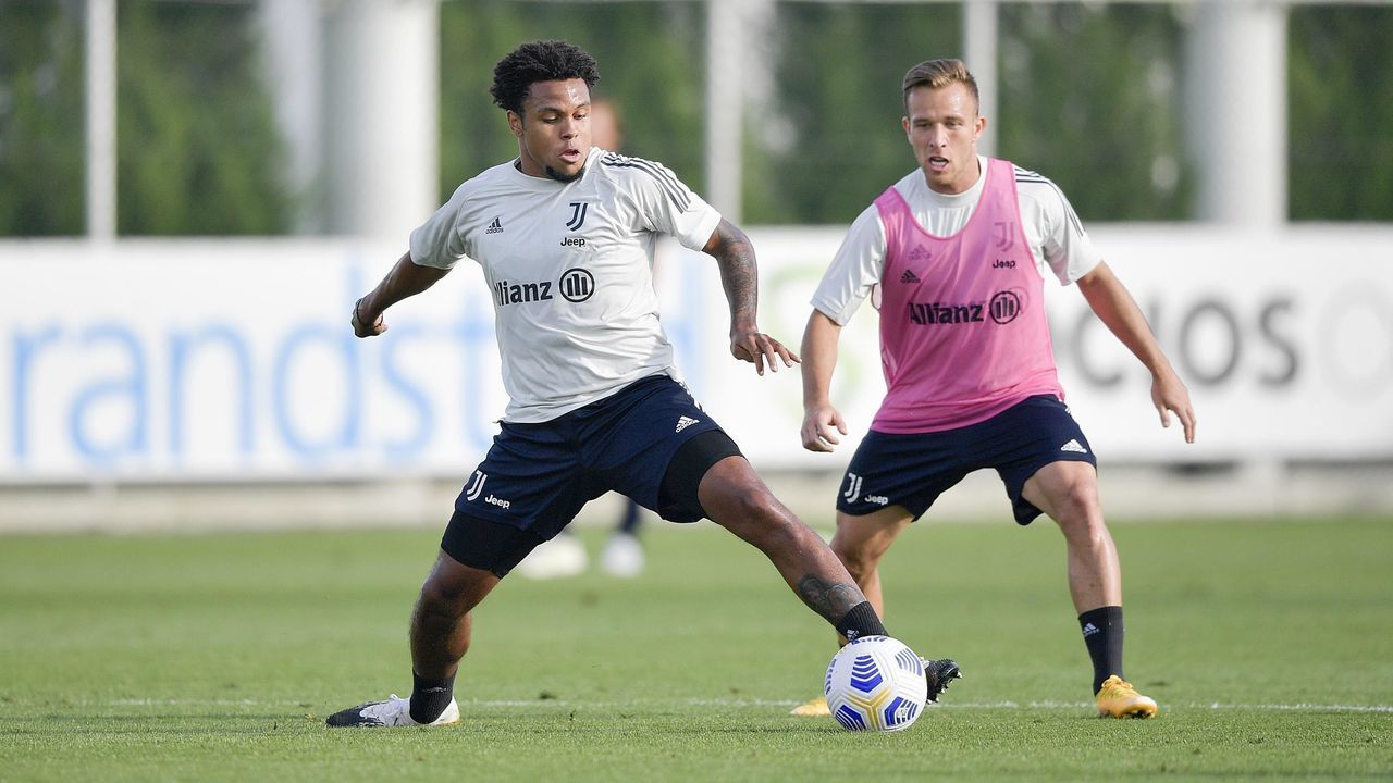 TURIN, ITALY - SEPTEMBER 29: Juventus players Weston McKennie and Arthur during a training session at JTC on September 29, 2020 in Turin, Italy.