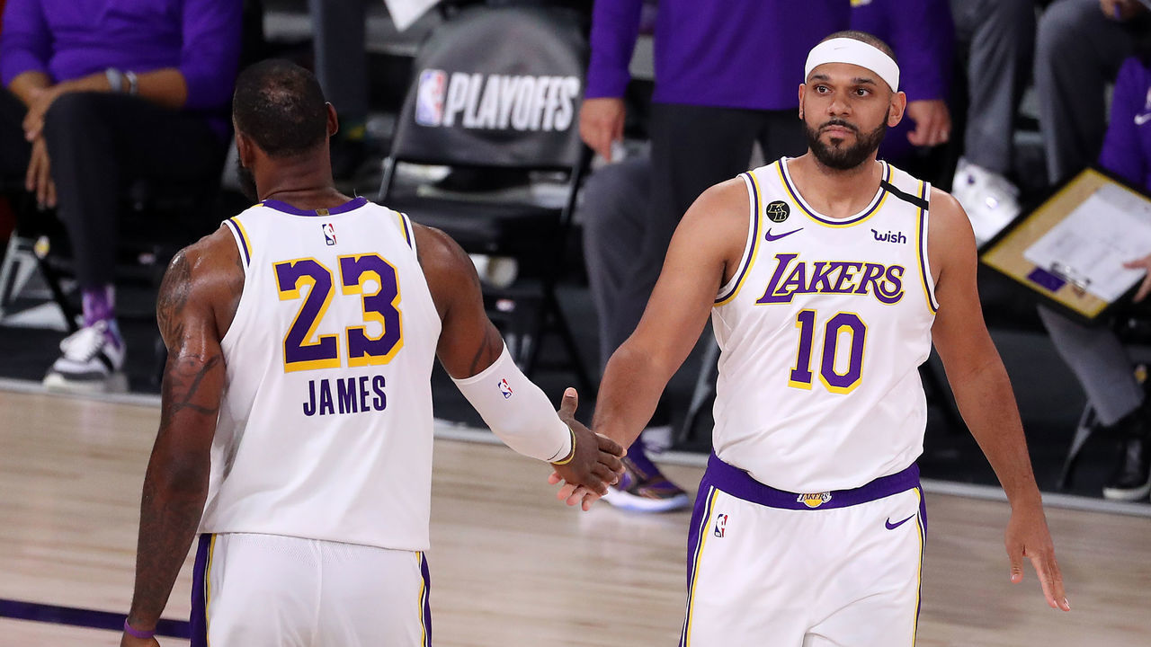 LAKE BUENA VISTA, FLORIDA - SEPTEMBER 12: LeBron James #23 of the Los Angeles Lakers high fives Jared Dudley #10 of the Los Angeles Lakers during the fourth quarter in Game Five of the Western Conference Second Round during the 2020 NBA Playoffs at AdventHealth Arena at the ESPN Wide World Of Sports Complex on September 12, 2020 in Lake Buena Vista, Florida.