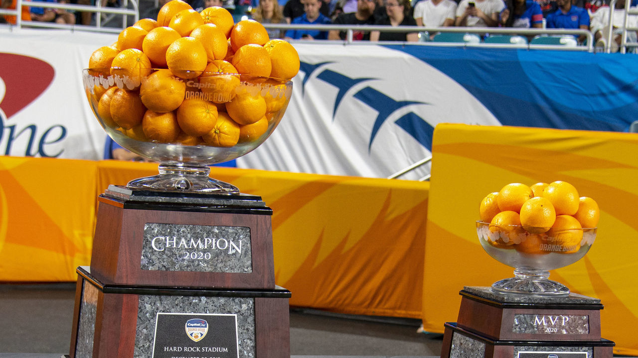 MIAMI GARDENS, FL - DECEMBER 30: The 2020 Orange Bowl Champion and MVP trophies on display during the College Football game between the Florida Gators and the Virginia Cavaliers at the Capital One Orange Bowl on December 30, 2019 at the Hard Rock Stadium in Miami Gardens, FL.