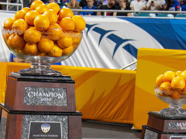 MIAMI GARDENS, FL - DECEMBER 30: The 2020 Orange Bowl Champion and MVP trophies on display during the College Football game between the Florida Gators and the Virginia Cavaliers at the Capital One Orange Bowl on December 30, 2019 at the Hard Rock Stadium in Miami Gardens, FL.