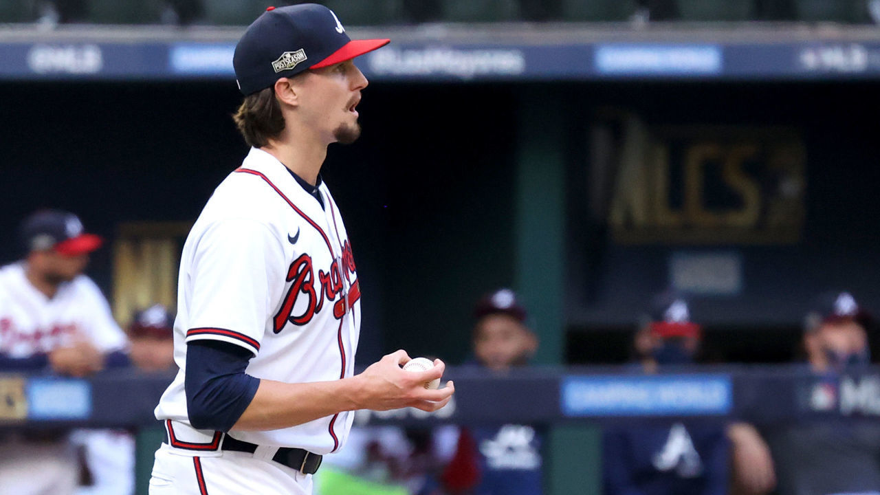 ARLINGTON, TEXAS - OCTOBER 14: Kyle Wright #30 of the Atlanta Braves reacts after allowing a run against the Los Angeles Dodgers during the first inning in Game Three of the National League Championship Series at Globe Life Field on October 14, 2020 in Arlington, Texas.