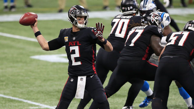 ATLANTA, GA - OCTOBER 11: Matt Ryan (2) of the Atlanta Falcons passes during the week 5 NFL game between the Atlanta Falcons and the Carolina Panthers at Mercedes-Benz Stadium on October 11, 2020 in Atlanta, Georgia.