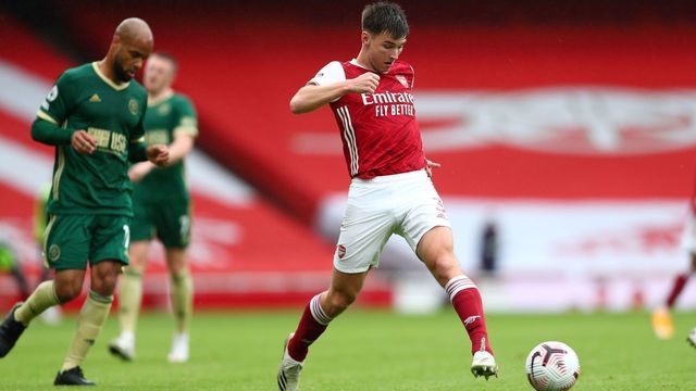 Arsenal's Scottish defender Kieran Tierney (C) controls the ball during the English Premier League football match between Arsenal and Sheffield United at the Emirates Stadium in London on October 4, 2020.