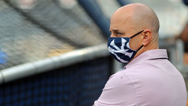 SAN DIEGO, CA - OCTOBER 06: New York Yankees General Manager Brian Cashman watches batting practice prior to Game 2 of the ALDS between the New York Yankees and the Tampa Bay Rays at Petco Park on Tuesday, October 6, 2020 in San Diego, California.