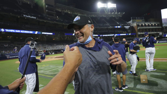 SAN DIEGO, CA - OCTOBER 09: Kevin Cash manager of the Tampa Bay Rays celebrates with the team after the Tampa Bay Rays beat the New York Yankees in Game 5 of the ALDS at Petco Park on Friday, October 9, 2020 in San Diego, California.