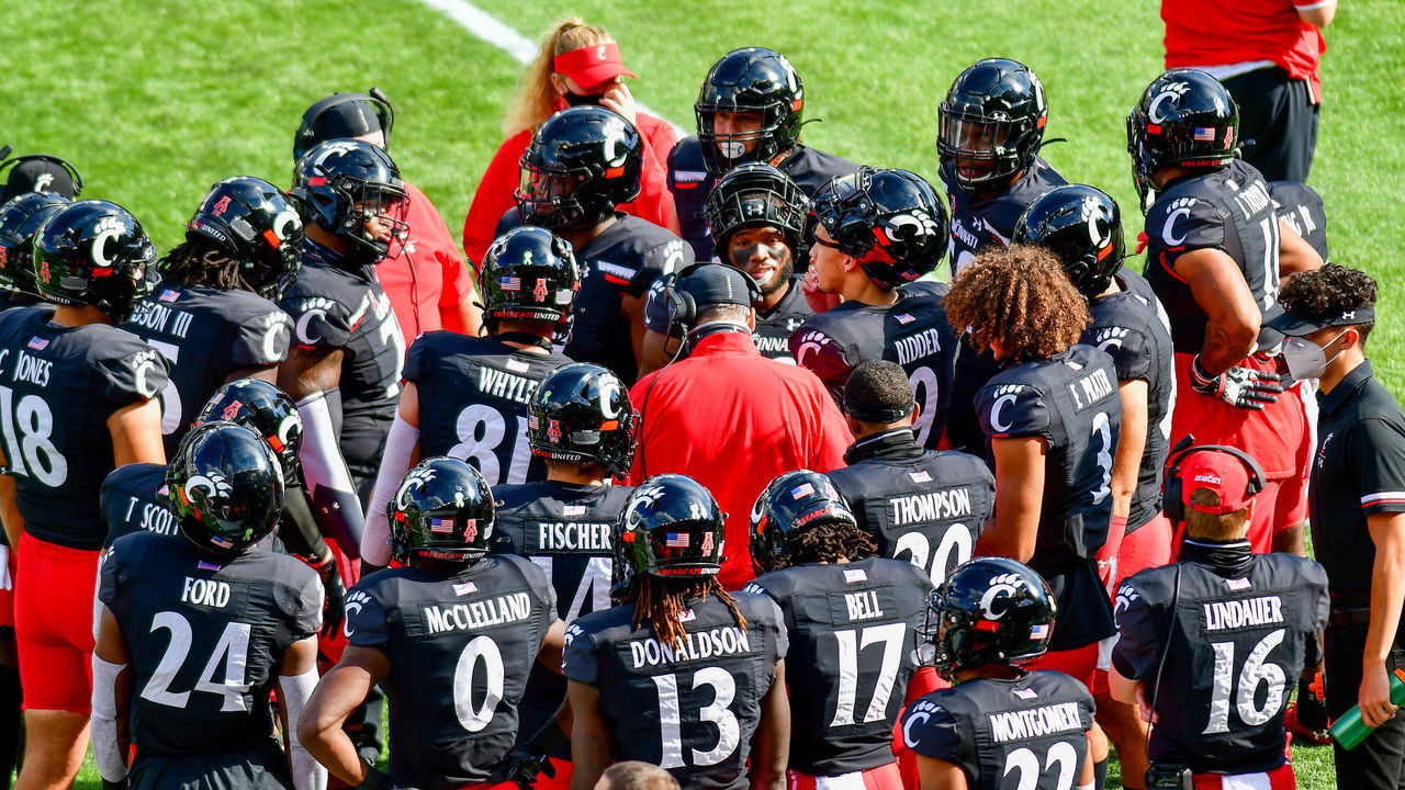 UC players huddle on the sidelines following a fumble recovery during an NCAA college football game at Nippert Stadium between the University of Cincinnati Bearcats and the University of South Florida. Cincinnati defeated USF 28-7. Saturday, October 3rd, 2020, in Cincinnati, Ohio, United States.