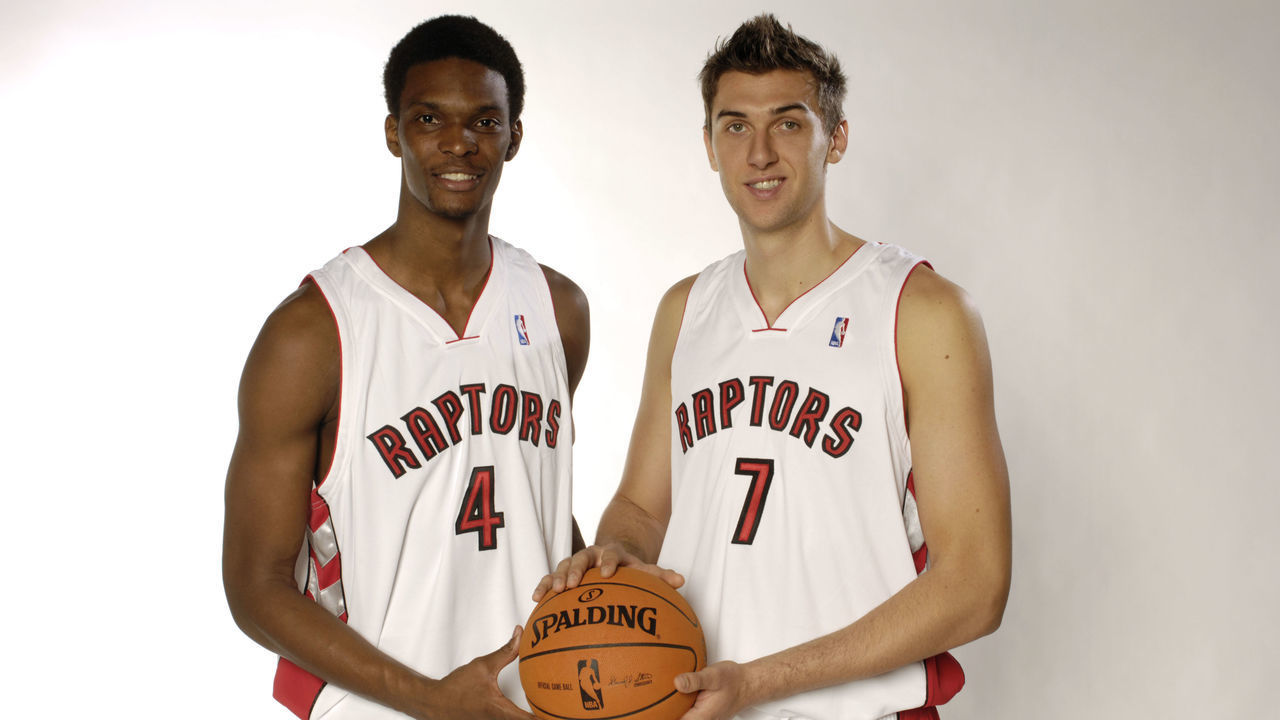 TORONTO - OCTOBER 2: Chris Bosh #4 (L) and Andrea Bargnani #7 of the Toronto Raptors pose for a portrait during NBA Media Day on October 2, 2006 in Toronto, Canada. NOTE TO USER: User expressly acknowledges and agrees that, by downloading and/or using this Photograph, user is consenting to the terms and conditions of the Getty Images License Agreement. Mandatory Copyright Notice: Copyright 2006 NBAE