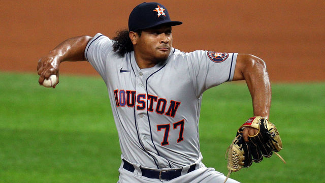 ARLINGTON, TEXAS - SEPTEMBER 24: Luis Garcia #77 of the Houston Astros pitches against the Texas Rangers at Globe Life Field on September 24, 2020 in Arlington, Texas.