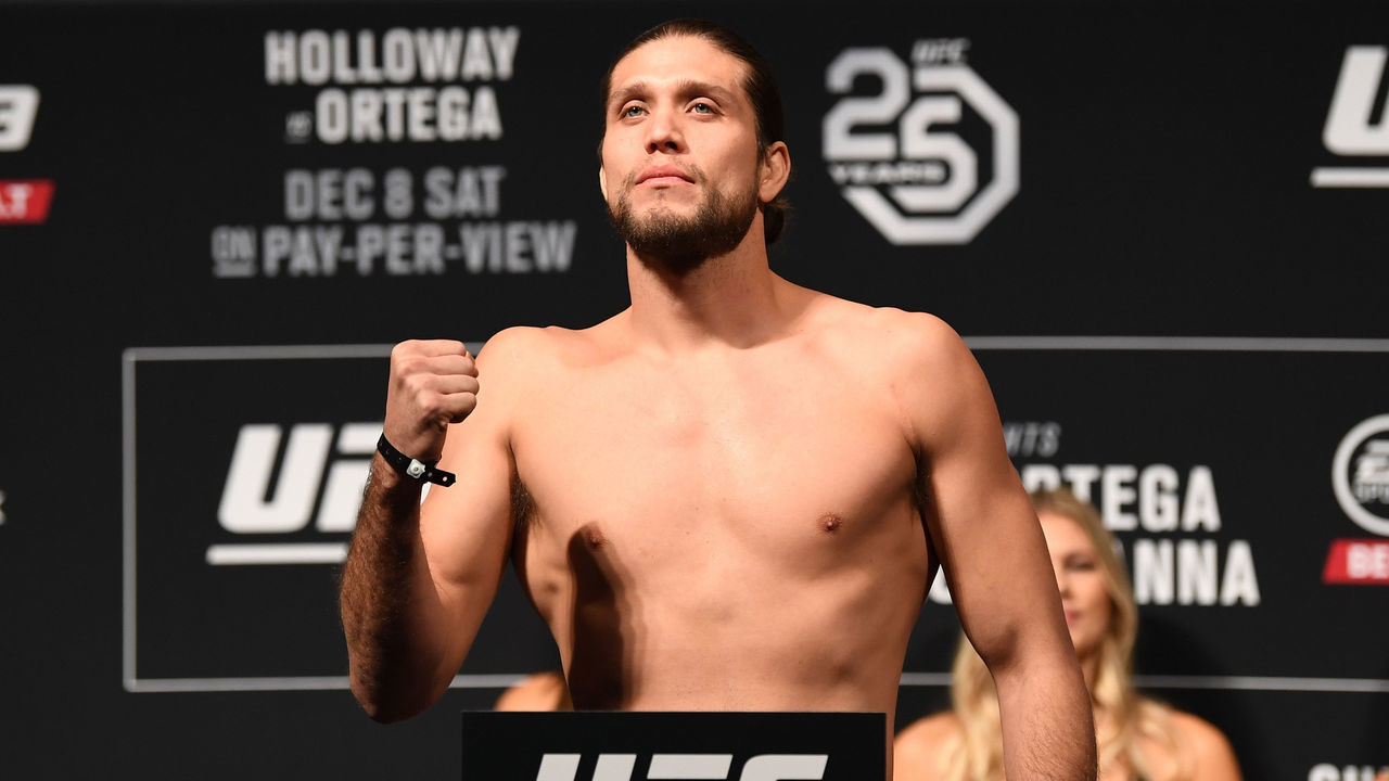 TORONTO, CANADA - DECEMBER 07: Brian Ortega poses on the scale during the UFC 231 weigh-in at Scotiabank Arena on December 7, 2018 in Toronto, Canada.