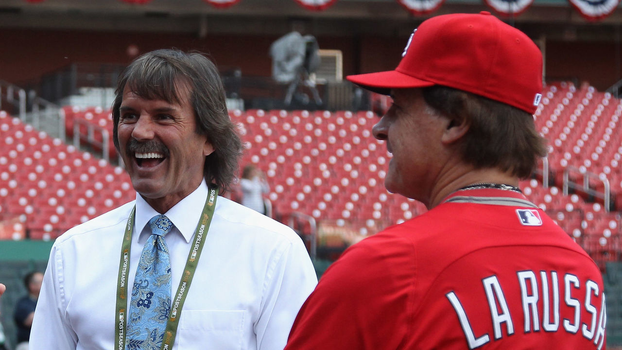 ST LOUIS, MO - OCTOBER 13: (L-R) Cal Ripken Jr., Dennis Eckersley and Manager Tony LaRussa #10 of the St. Louis Cardinals talk during battin gpractice prior to the Cardinals playing against the Milwaukee Brewers\during Game 4 of the National League Championship Series at Busch Stadium on October 13, 2011 in St. Louis, Missouri.