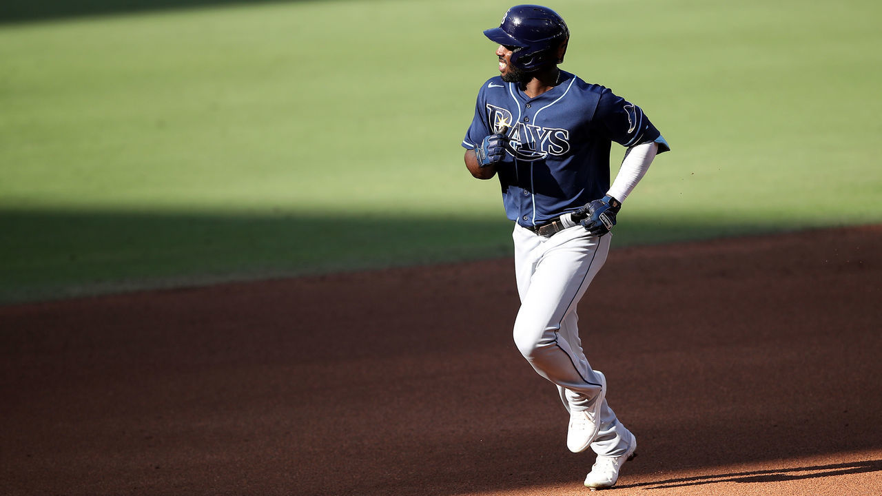 SAN DIEGO, CALIFORNIA - OCTOBER 15: Randy Arozarena #56 of the Tampa Bay Rays rounds the bases after hitting a solo home run against the Houston Astros during the fifth inning in Game Five of the American League Championship Series at PETCO Park on October 15, 2020 in San Diego, California.