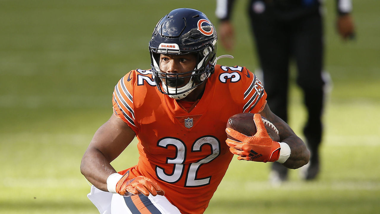 CHICAGO, IL - OCTOBER 04: Chicago Bears Running Back David Montgomery (32) looks to avoid Indianapolis Colts Cornerback Xavier Rhodes (27) during the NFL football game between the Indianapolis Colts and the Chicago Bears on October 4, 2020 at Soldier Field in Chicago, IL.