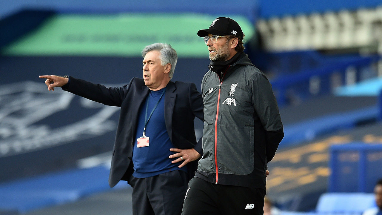LIVERPOOL, ENGLAND - JUNE 21: (THE SUN OUT, THE SUN ON SUNDAY OUT) Jurgen Klopp of Liverpool with Carlo Ancelotti of Everton during the Premier League match between Everton FC and Liverpool FC at Goodison Park on June 21, 2020 in Liverpool, England. Football Stadiums around Europe remain empty due to the Coronavirus Pandemic as Government social distancing laws prohibit fans inside venues resulting in all fixtures being played behind closed doors.