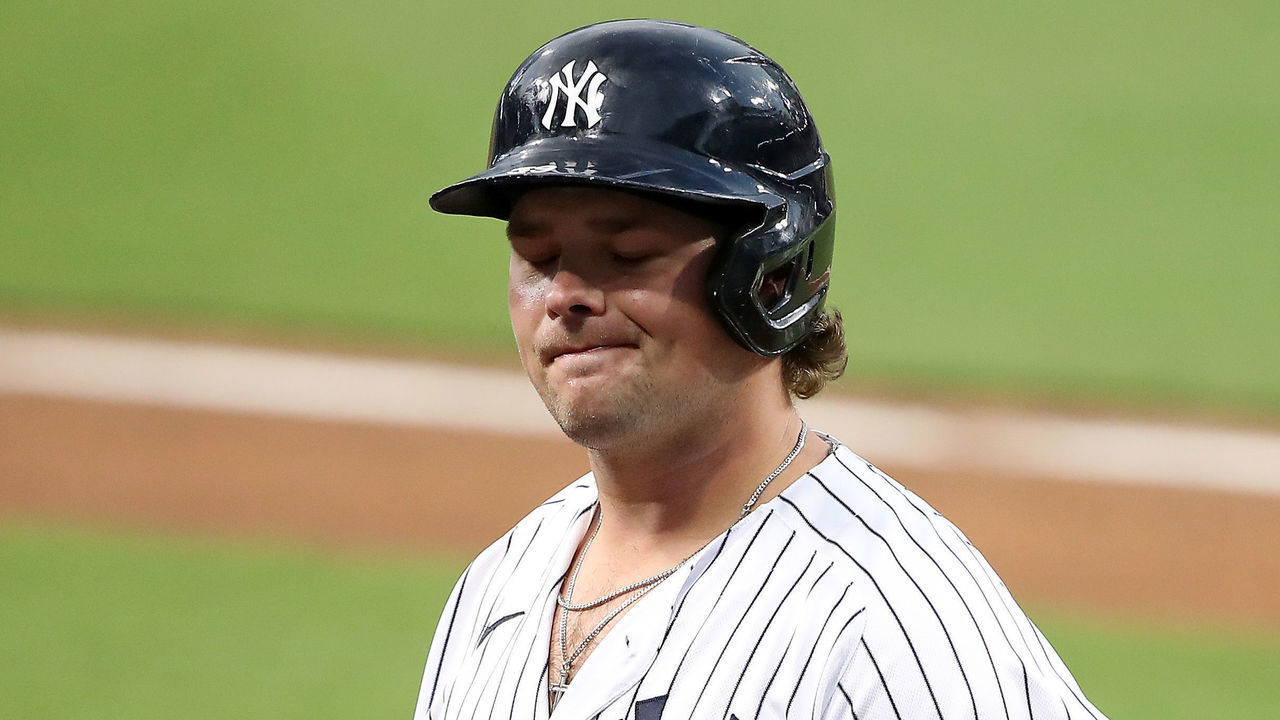 SAN DIEGO, CALIFORNIA - OCTOBER 08: Luke Voit #59 of the New York Yankees reacts after flying out against the Tampa Bay Rays during the sixth inning in Game Four of the American League Division Series at PETCO Park on October 08, 2020 in San Diego, California.