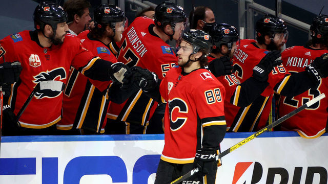 EDMONTON, ALBERTA - AUGUST 20: Andrew Mangiapane #88 of the Calgary Flames celebrates his goal against the Dallas Stars with teammates during the first period of Game Six of the Western Conference First Round of the 2020 NHL Stanley Cup Playoffs at Rogers Place on August 20, 2020 in Edmonton, Alberta.