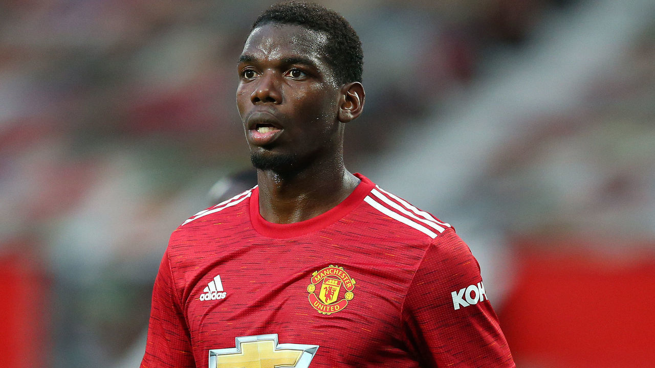 MANCHESTER, ENGLAND - OCTOBER 04: Paul Pogba of Manchester United looks on during the Premier League match between Manchester United and Tottenham Hotspur at Old Trafford on October 04, 2020 in Manchester, England. Sporting stadiums around the UK remain under strict restrictions due to the Coronavirus Pandemic as Government social distancing laws prohibit fans inside venues resulting in games being played behind closed doors.