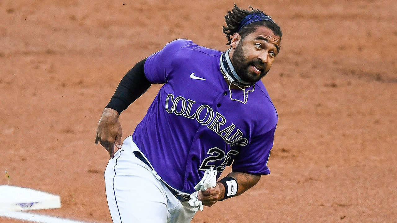 DENVER, CO - AUGUST 19: Colorado Rockies left fielder Matt Kemp (25) rounds third base before scoring a second inning run against the Houston Astros during a game at Coors Field in Denver, Colorado on August 19, 2020.