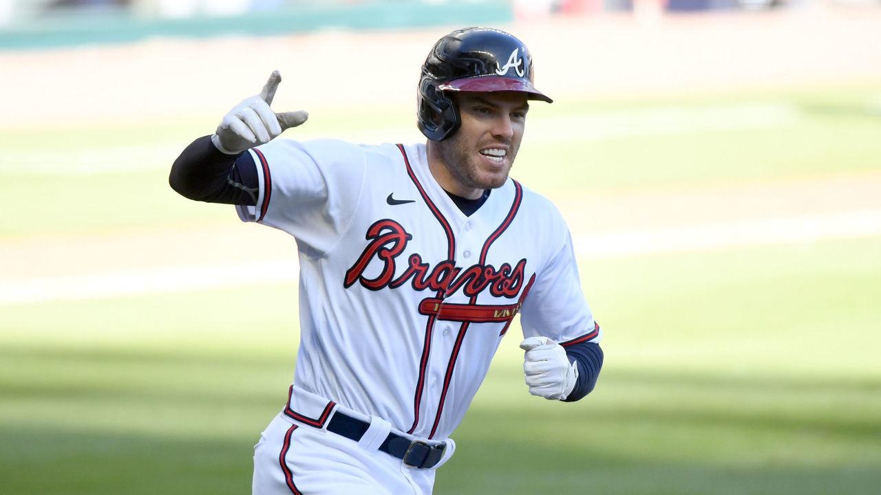 ATLANTA, GA - SEPTEMBER 30: Freddie Freeman #5 of the Atlanta Braves celebrates after hitting a walk-off single to win Game 1 of the Wild Card Series between the Cincinnati Reds and the Atlanta Braves at Truist Park on Wednesday, September 30, 2020 in Atlanta, Georgia. The Braves defeated the Reds 1-0 in 13 innings.