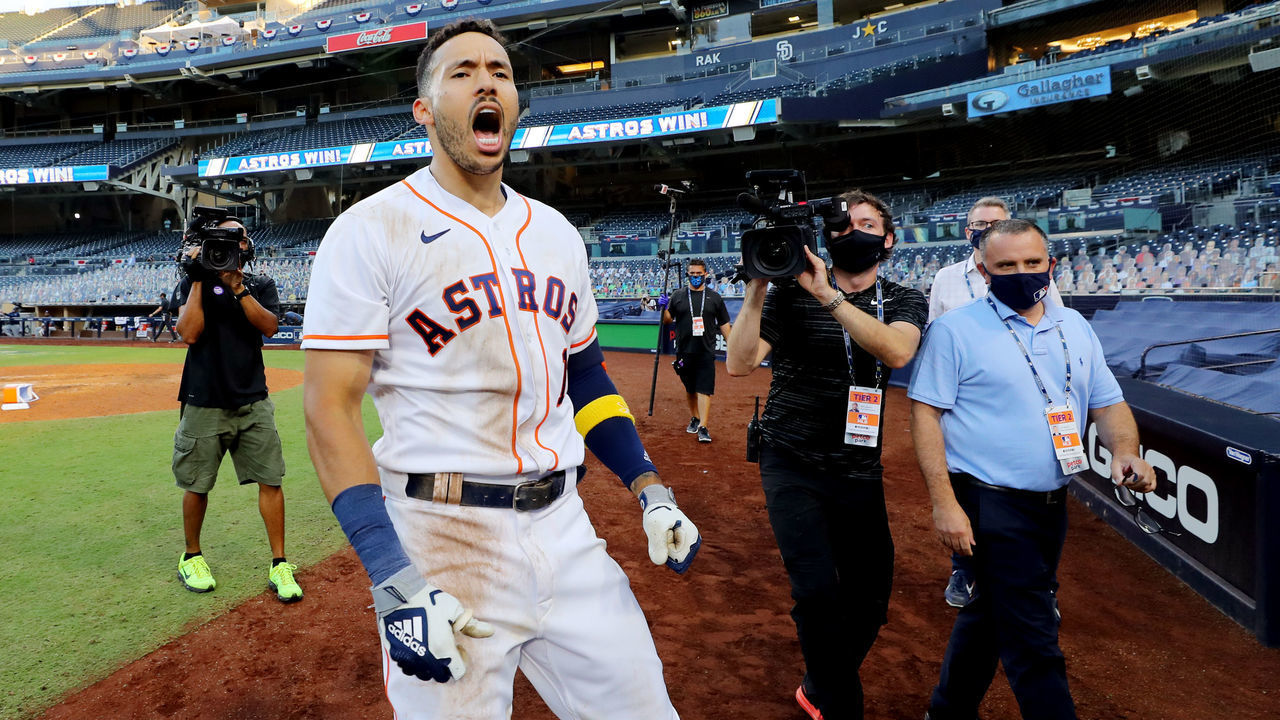 SAN DIEGO, CA - OCTOBER 15: Carlos Correa #1 of the Houston Astros celebrates with teammates after hitting a game-winning walk off home run in the ninth inning to beat the Tampa Bay Rays in Game 5 of the ALCSat Petco Park on Thursday, October 15, 2020 in San Diego, California.