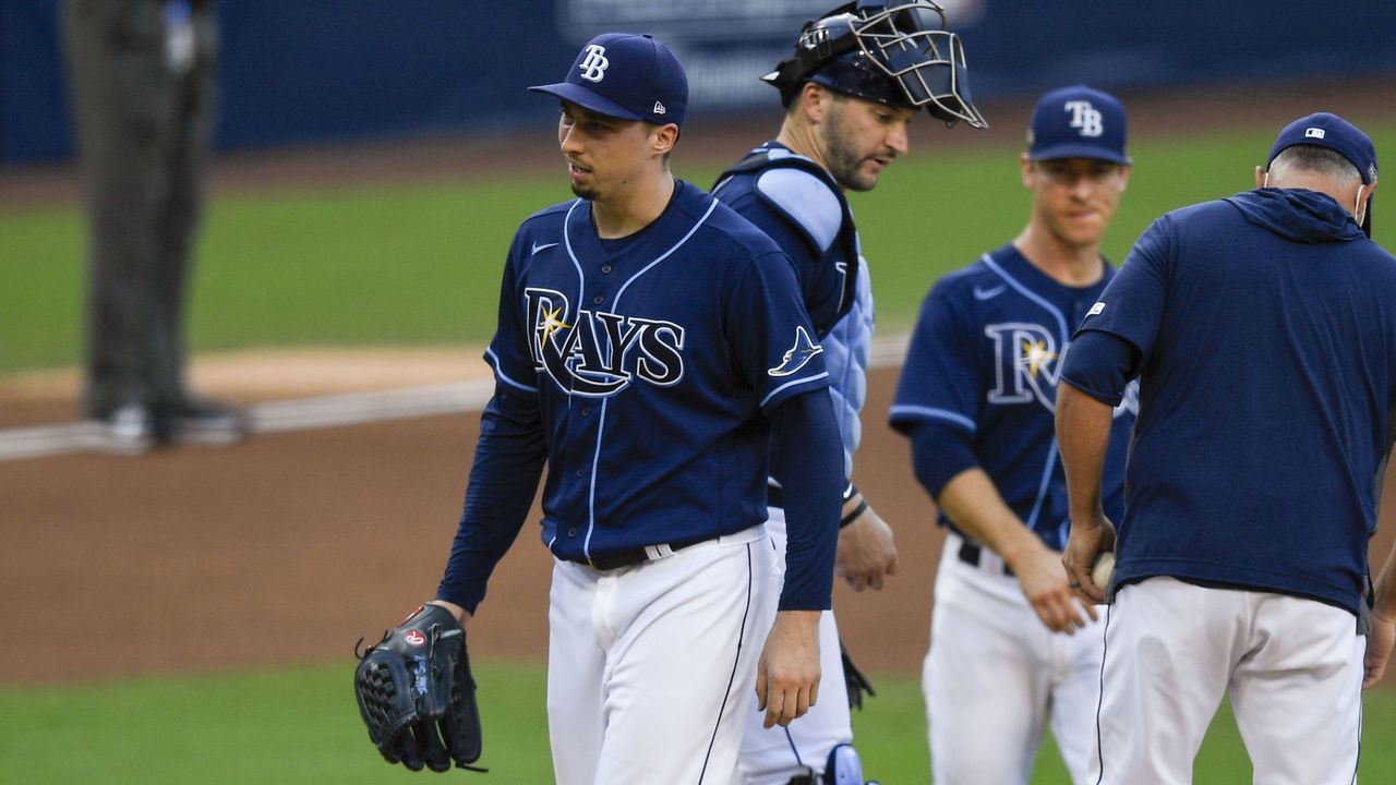 SAN DIEGO, CA - OCTOBER 16: Blake Snell #4 of the Tampa Bay Rays walks off the mound after getting pulled in the fifth inning during Game 6 of the ALCS between the Tampa Bay Rays and the Houston Astros at Petco Park on Friday, October 16, 2020 in San Diego, California.