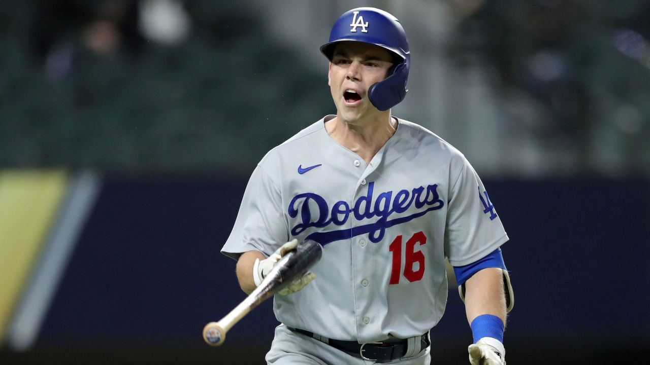 ARLINGTON, TX - OCTOBER 16: Will Smith #16 of the Los Angeles Dodgers reacts after hitting a three-run home run in the sixth inning of Game 5 of the NLCS between the Atlanta Braves and the Los Angeles Dodgers at Globe Life Field on Friday, October 16, 2020 in Arlington, Texas.