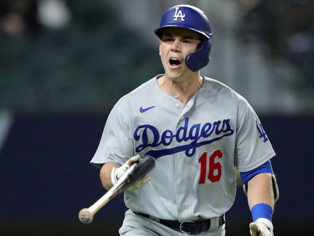 ARLINGTON, TX - OCTOBER 16: Will Smith #16 of the Los Angeles Dodgers reacts after hitting a three-run home run in the sixth inning of Game 5 of the NLCS between the Atlanta Braves and the Los Angeles Dodgers at Globe Life Field on Friday, October 16, 2020 in Arlington, Texas.