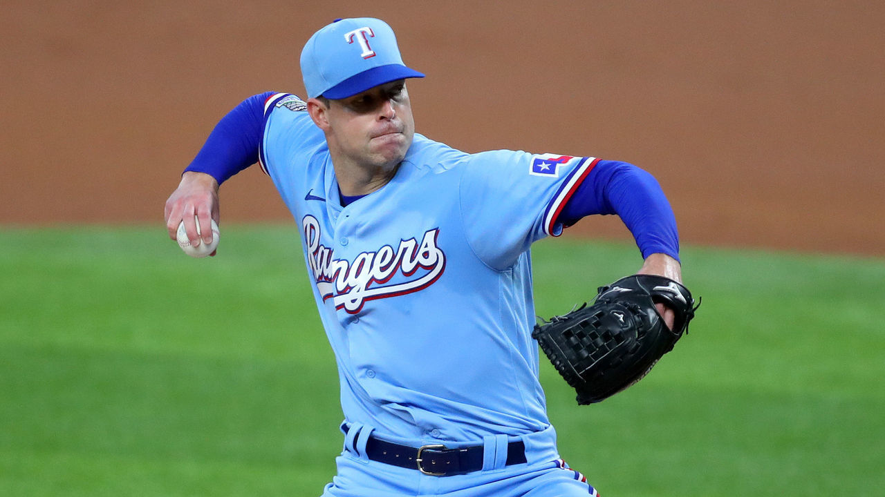 ARLINGTON, TEXAS - JULY 26: Corey Kluber (28) of the Texas Rangers pitches against the Colorado Rockies in the top of the first inning at Globe Life Field on July 26, 2020 in Arlington, Texas.