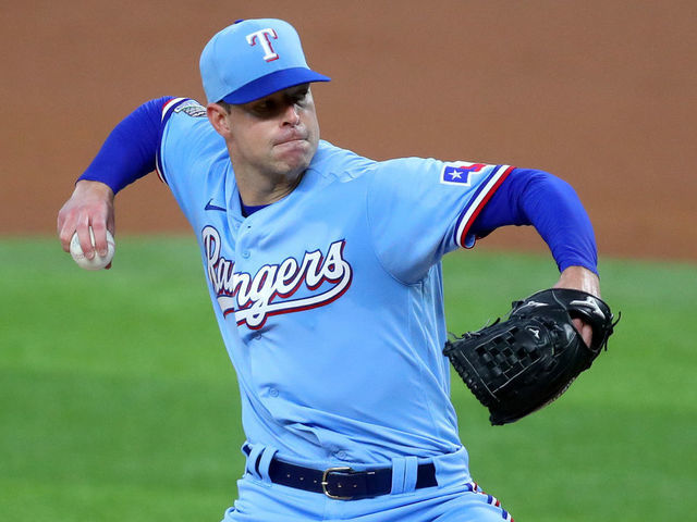 ARLINGTON, TEXAS - JULY 26: Corey Kluber (28) of the Texas Rangers pitches against the Colorado Rockies in the top of the first inning at Globe Life Field on July 26, 2020 in Arlington, Texas.