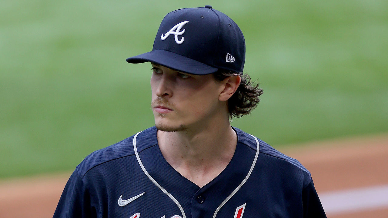 ARLINGTON, TEXAS - OCTOBER 17: Max Fried #54 of the Atlanta Braves reacts against the Los Angeles Dodgers during the first inning in Game Six of the National League Championship Series at Globe Life Field on October 17, 2020 in Arlington, Texas.