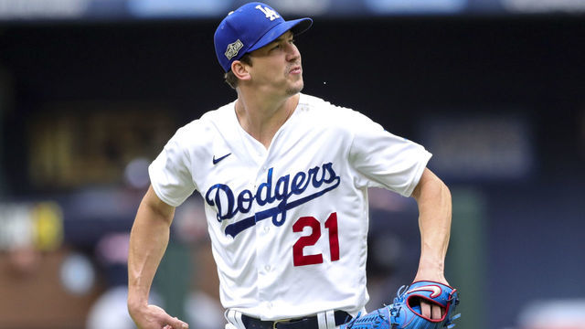 ARLINGTON, TX - OCTOBER 17: Walker Buehler #21 of the Los Angeles Dodgers celebrates in the second inning during Game 6 of the NLCS between the Atlanta Braves and the Los Angeles Dodgers at Globe Life Field on Saturday, October 17, 2020 in Arlington, Texas.