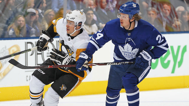TORONTO, ON - OCTOBER 18: Sidney Crosby #87 of the Pittsburgh Penguins skates against Kasperi Kapanen #24 of the Toronto Maple Leafs during an NHL game at Scotiabank Arena on October 18, 2018 in Toronto, Ontario, Canada. The Penguins defeated the Maple Leafs 3-0.
