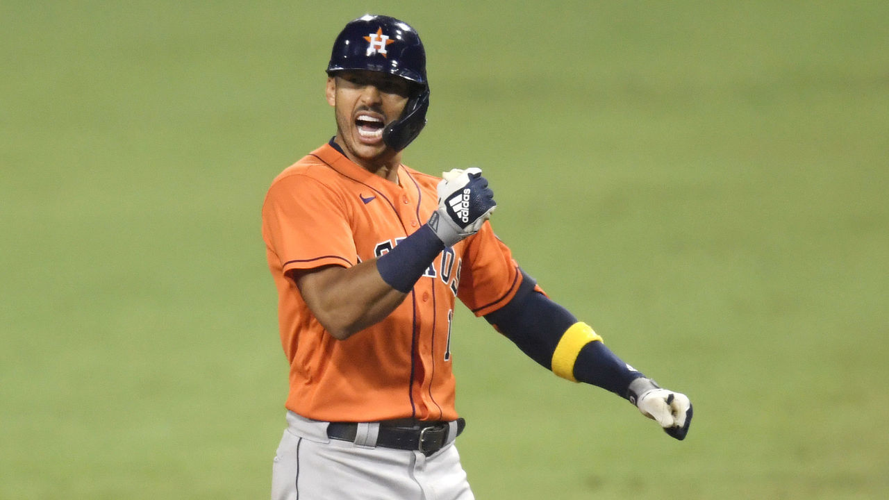 SAN DIEGO, CALIFORNIA - OCTOBER 17: Carlos Correa #1 of the Houston Astros celebrates a two RBI single against the Tampa Bay Rays during the eighth inning in Game Seven of the American League Championship Series at PETCO Park on October 17, 2020 in San Diego, California.