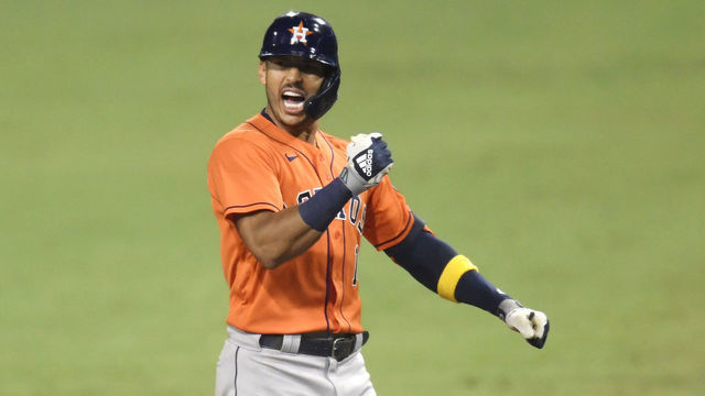 SAN DIEGO, CALIFORNIA - OCTOBER 17: Carlos Correa #1 of the Houston Astros celebrates a two RBI single against the Tampa Bay Rays during the eighth inning in Game Seven of the American League Championship Series at PETCO Park on October 17, 2020 in San Diego, California.