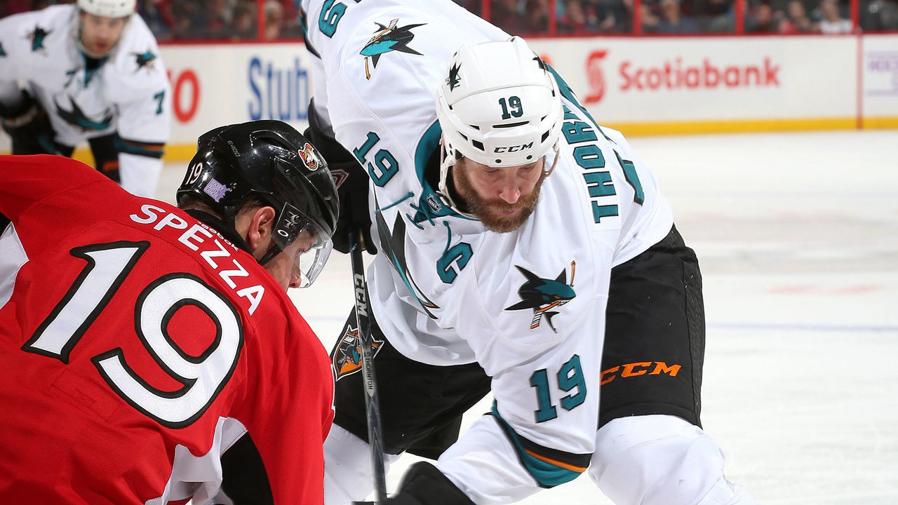 OTTAWA, ON - OCTOBER 27: Jason Spezza #19 of the Ottawa Senators faces off against Joe Thornton #19 of the San Jose Sharks at Canadian Tire Centre on October 27, 2013 in Ottawa, Ontario, Canada.