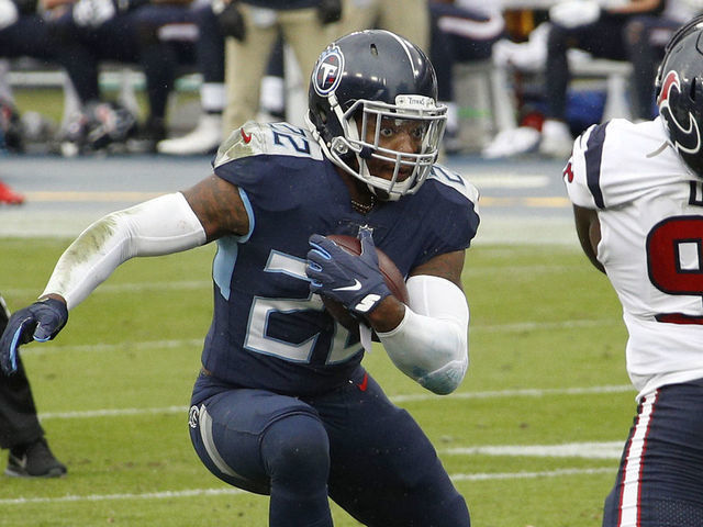 NASHVILLE, TENNESSEE - OCTOBER 18: Running back Derrick Henry #22 of the Tennessee Titans runs with the ball against the Houston Texans at Nissan Stadium on October 18, 2020 in Nashville, Tennessee.