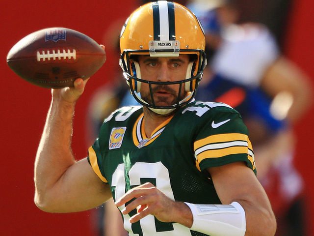 TAMPA, FLORIDA - OCTOBER 18: Aaron Rodgers #12 of the Green Bay Packers throws against the Tampa Bay Buccaneers during the first quarter at Raymond James Stadium on October 18, 2020 in Tampa, Florida.