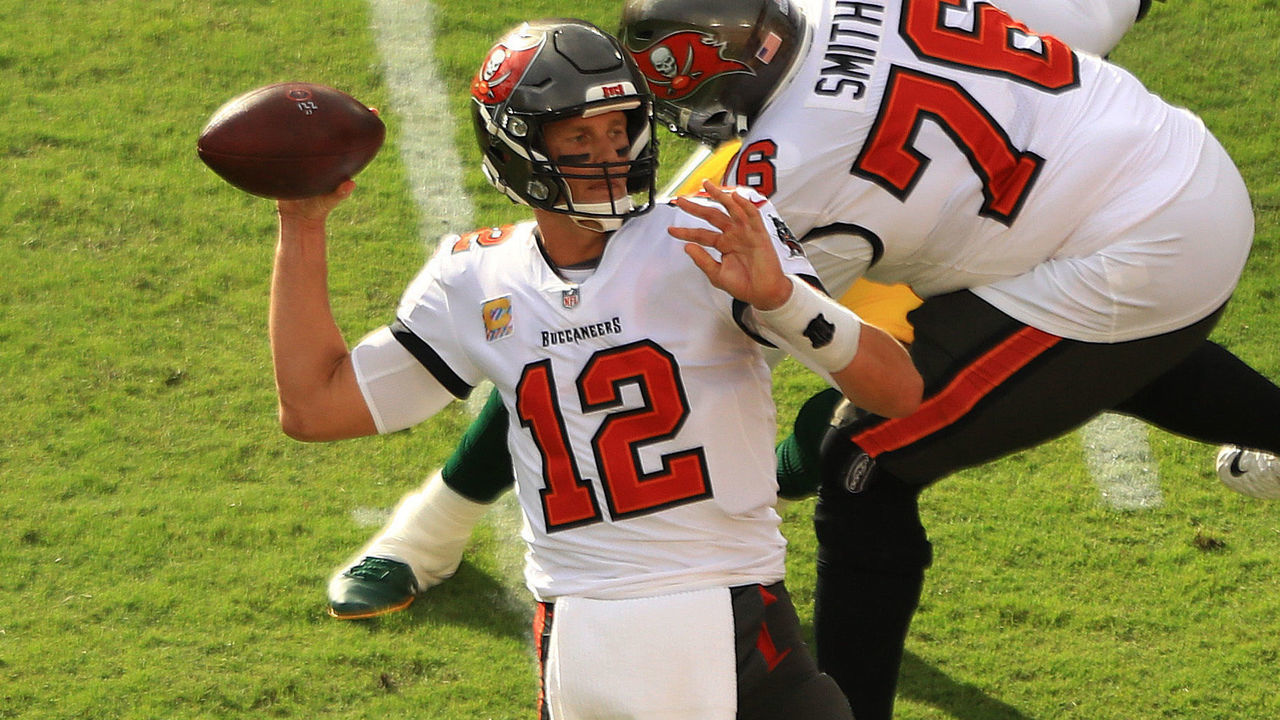 TAMPA, FLORIDA - OCTOBER 18: Tom Brady #12 of the Tampa Bay Buccaneers looks to pass against the Green Bay Packers during the first quarter at Raymond James Stadium on October 18, 2020 in Tampa, Florida.