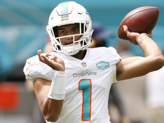 Ryan Fitzpatrick of the Miami Dolphins warms up prior to the game