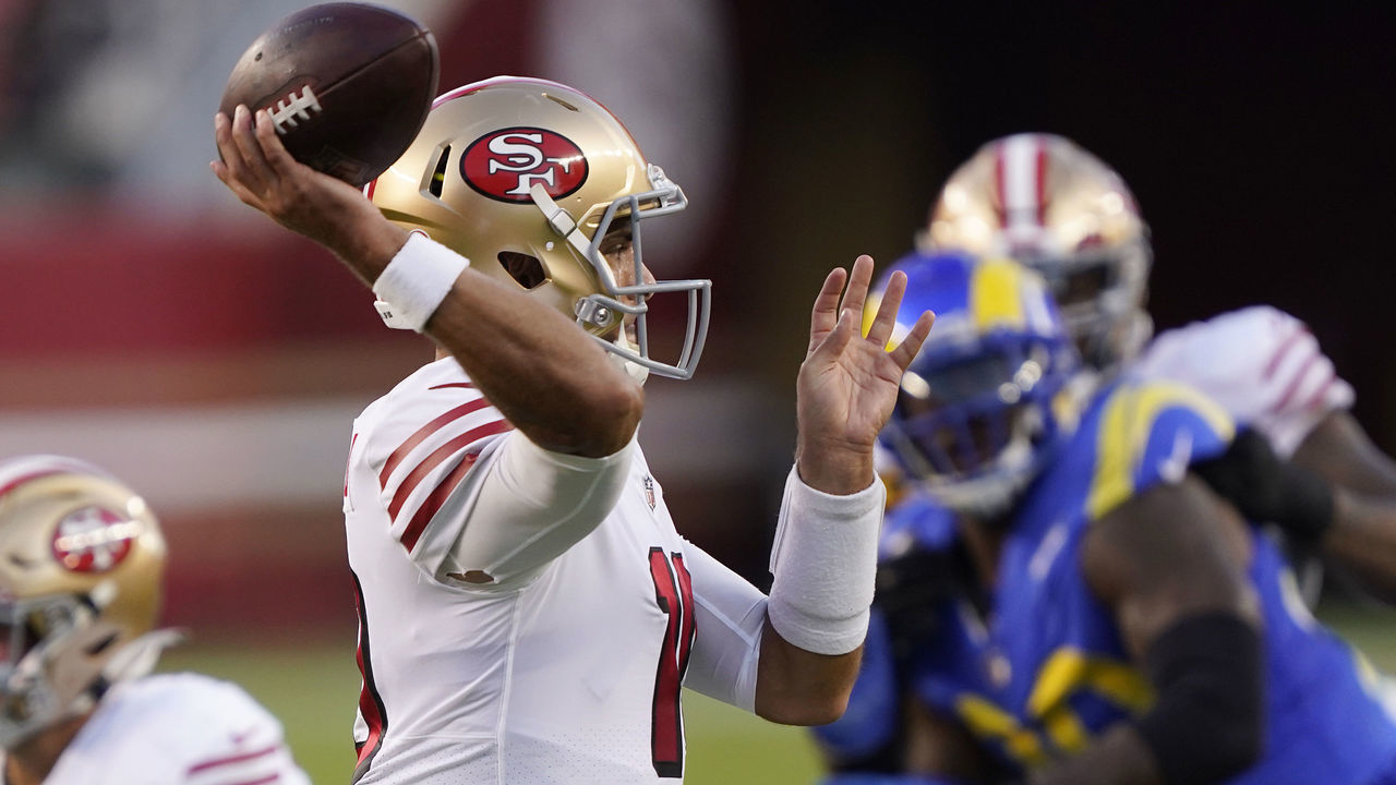 SANTA CLARA, CALIFORNIA - OCTOBER 18: Jimmy Garoppolo #10 of the San Francisco 49ers passes against the Los Angeles Rams during the first quarter at Levi's Stadium on October 18, 2020 in Santa Clara, California.