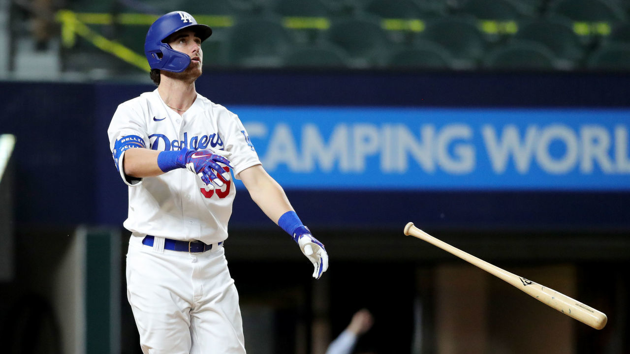 ARLINGTON, TX - OCTOBER 18: Cody Bellinger #35 of the Los Angeles Dodgers hits a solo home run in the seventh inning during Game 7 of the NLCS between the Atlanta Braves and the Los Angeles Dodgers at Globe Life Field on Sunday, October 18, 2020 in Arlington, Texas.