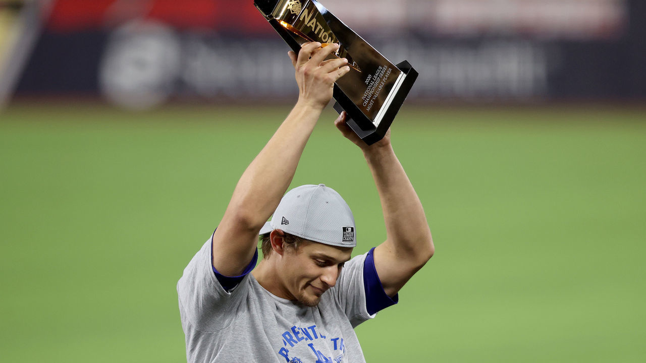 ARLINGTON, TEXAS - OCTOBER 18: Corey Seager #5 of the Los Angeles Dodgers is awarded the Most Valuable Player award following the teams 4-3 victory against the Atlanta Braves in Game Seven of the National League Championship Series at Globe Life Field on October 18, 2020 in Arlington, Texas.