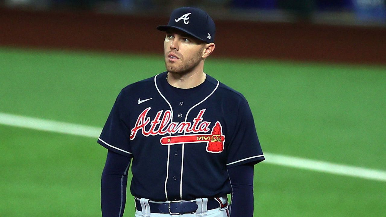 ARLINGTON, TEXAS - OCTOBER 18: Freddie Freeman #5 of the Atlanta Braves looks on against the Los Angeles Dodgers during the eighth inning in Game Seven of the National League Championship Series at Globe Life Field on October 18, 2020 in Arlington, Texas.