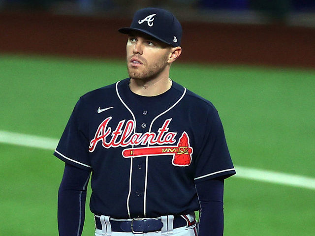 Atlanta Braves first baseman Freddie Freeman with his 2020 NL MVP News  Photo - Getty Images