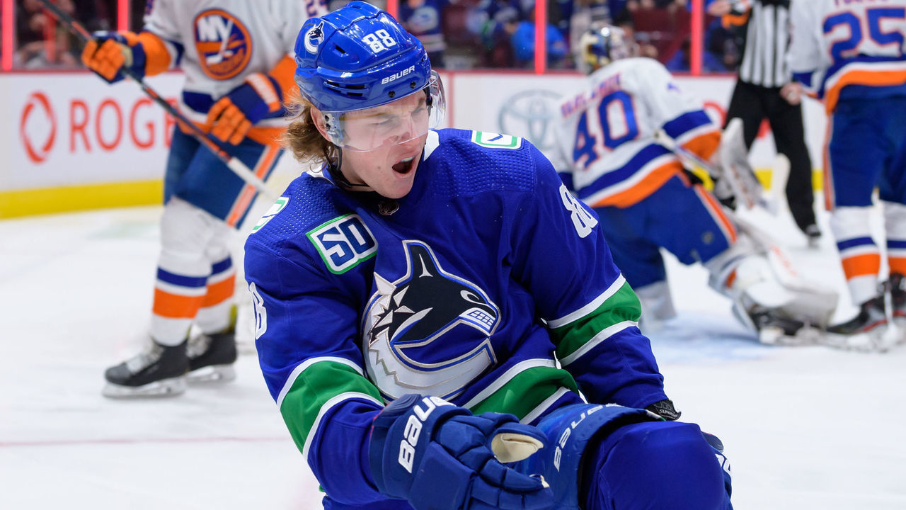 VANCOUVER, BC - MARCH 10: Vancouver Canucks Center Adam Gaudette (88) celebrates after scoring a goal against the New York Islanders during their NHL game at Rogers Arena on March 10, 2020 in Vancouver, British Columbia, Canada.