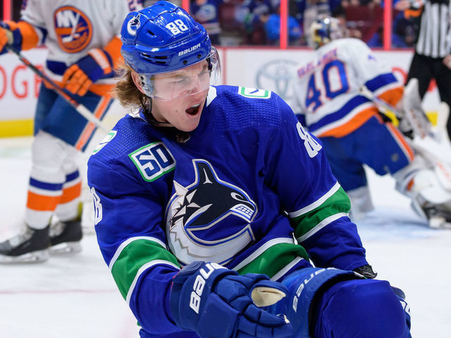 VANCOUVER, BC - MARCH 10: Vancouver Canucks Center Adam Gaudette (88) celebrates after scoring a goal against the New York Islanders during their NHL game at Rogers Arena on March 10, 2020 in Vancouver, British Columbia, Canada.