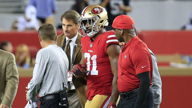 SANTA CLARA, CA - NOVEMBER 01: Raheem Mostert #31 of the San Francisco 49ers is walked off after injuring his arm during their NFL game against the Oakland Raiders at Levi's Stadium on November 1, 2018 in Santa Clara, California.